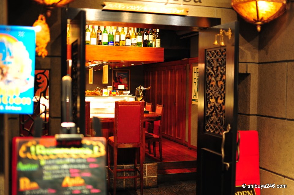 A red restaurant entrance with a menu board