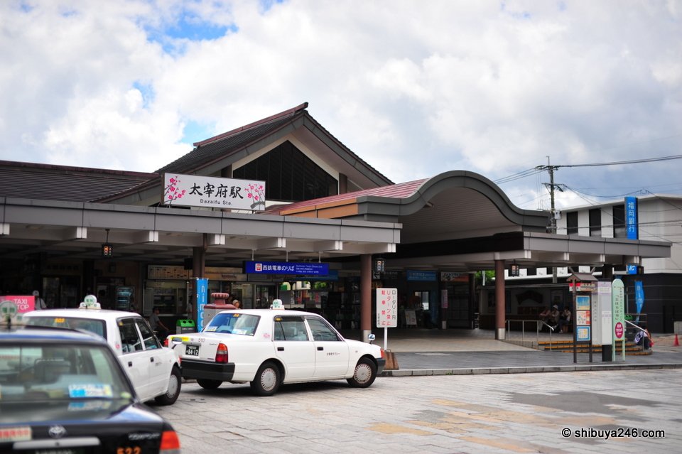 The station front with taxis waiting