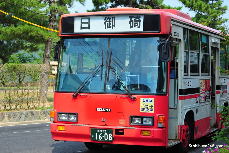 A red and white local bus