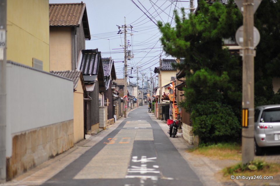 A narrow street between houses