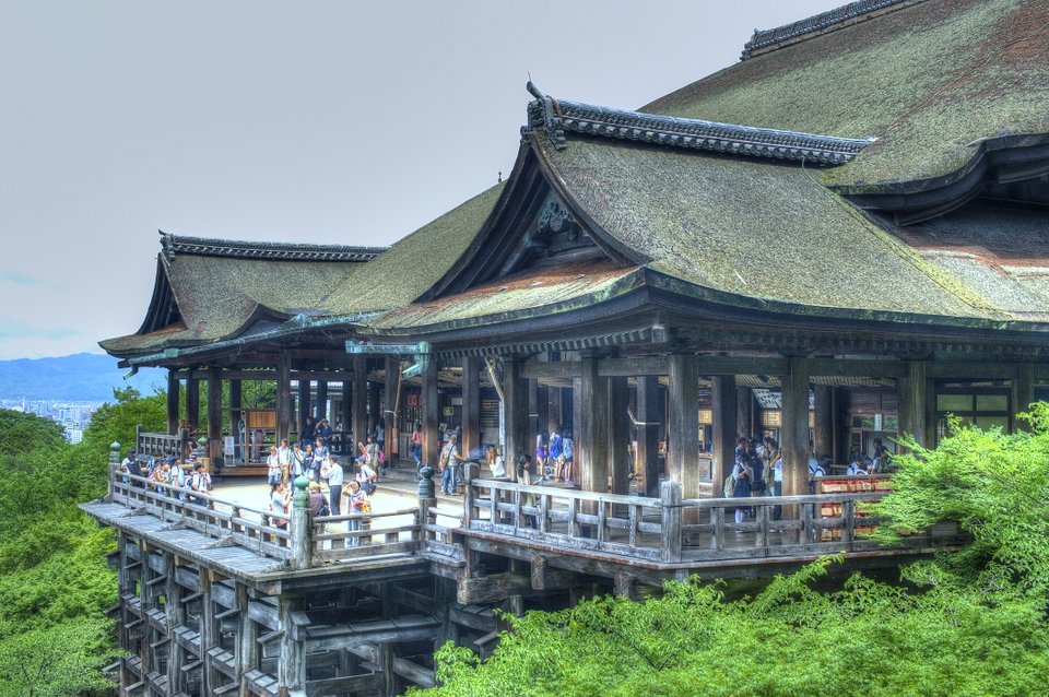 The wooden stage of the main hall built out over the trees
