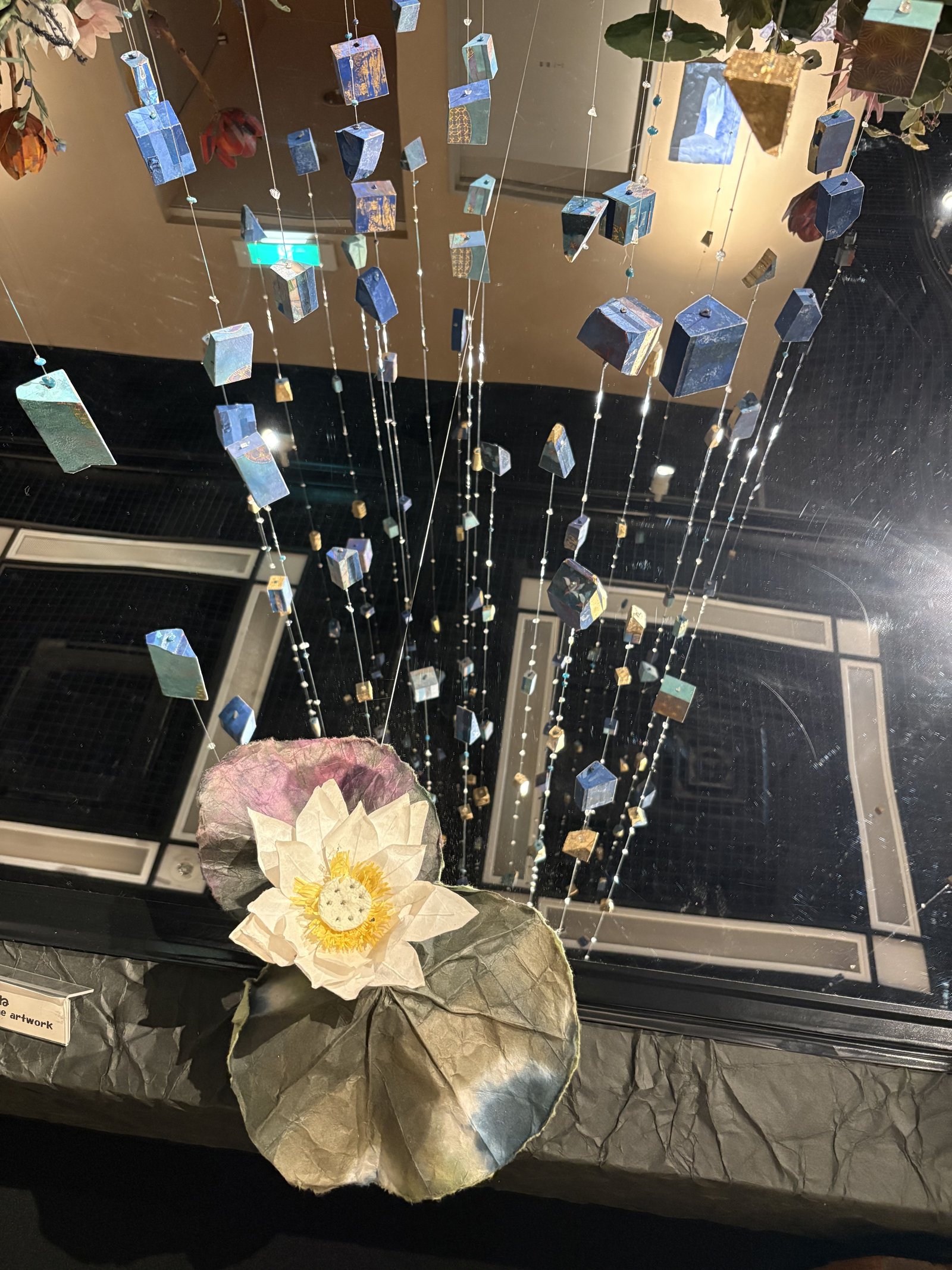 Paper flowers and hanging paper squares