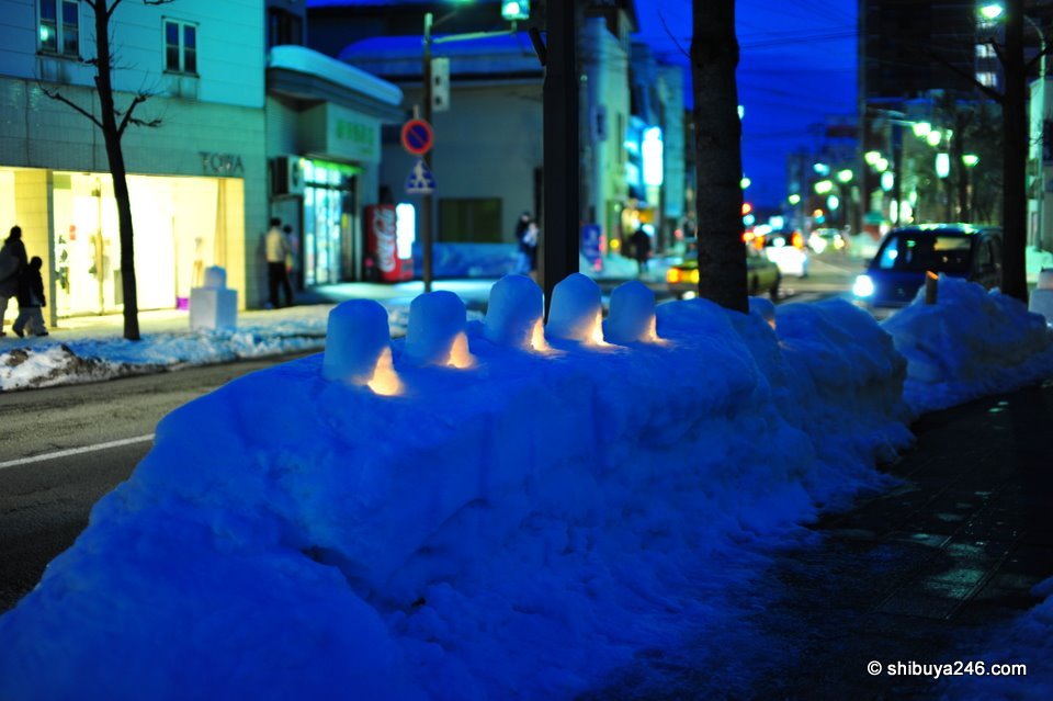 A few more mini snow huts set up on the side of the road. Lighting these all up at night with candles made a nice site, and at least the snow would help avoid any accidents with fire.