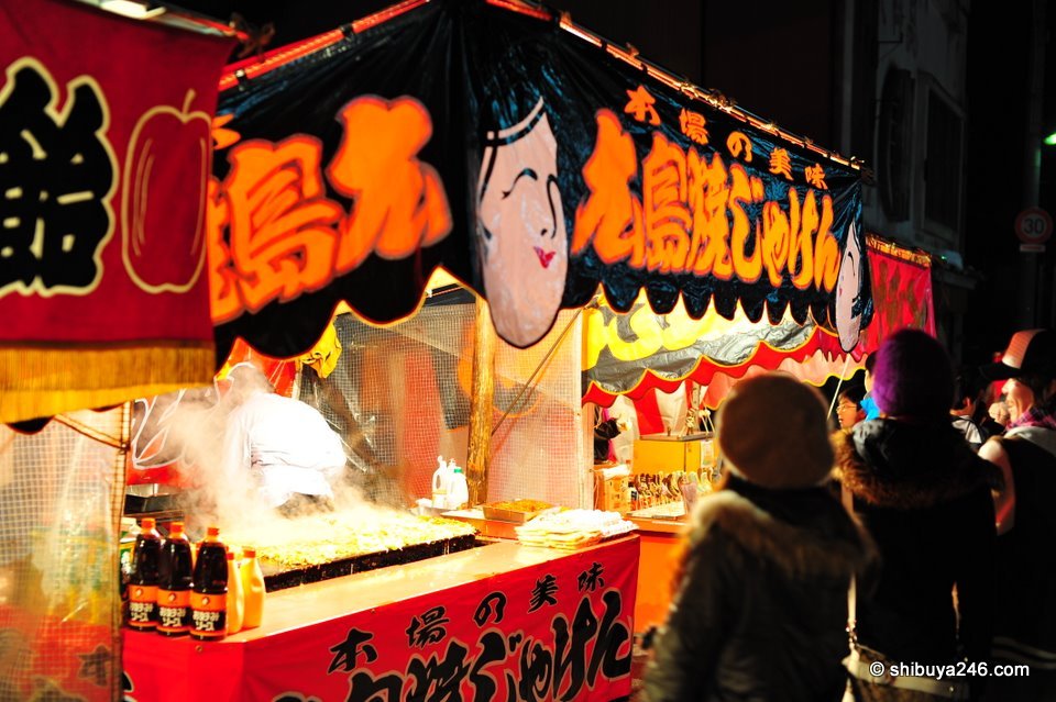 The colors really shone through from these stalls. With it being cold out and the food looking great, everyone was tucking in.