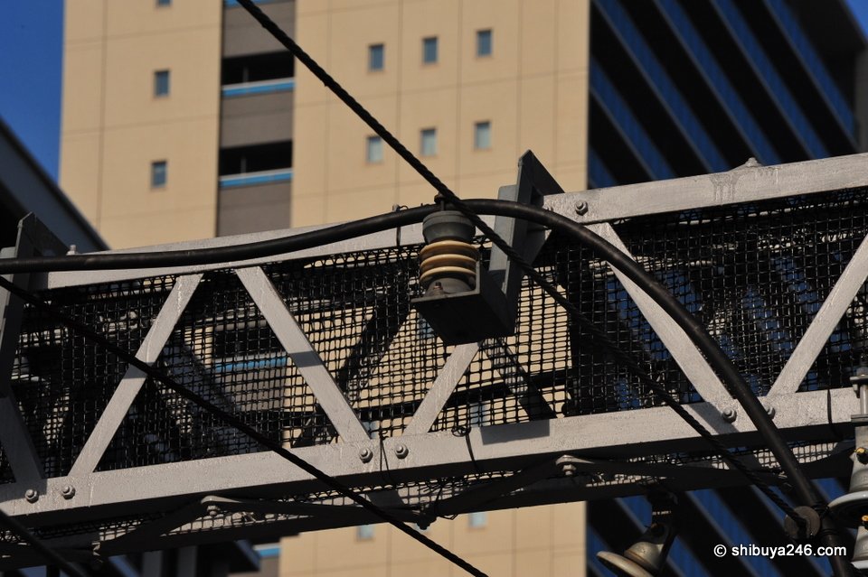 One of the many overhead electric lines.