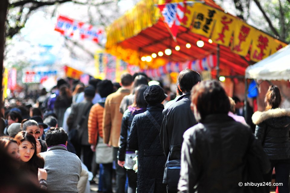 The bright yellow and red colors match well against the dark clothing.